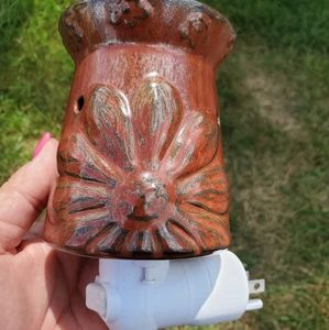 Scentsy plug in scent warmer.